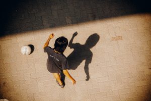 A child playing soccer