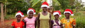 A group of girls in Christmas Hats