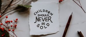 Image Saying Children Should Never Be Sold